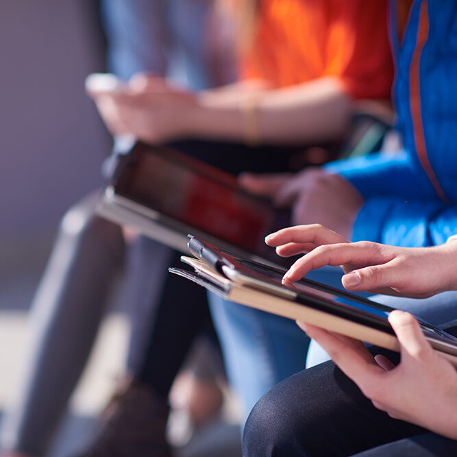students-with-tablets-SBI-300840346